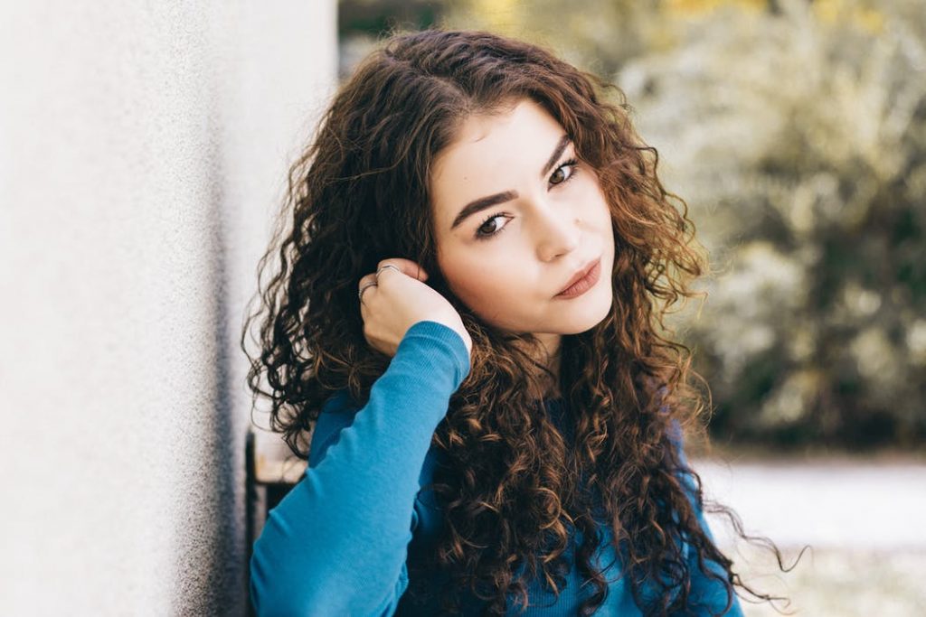 woman with a curl hair